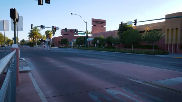 Automobiles drive through an intersection