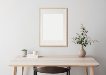 Blank picture frame mockup on wall in modern minimalist interior. Artwork template mock up in scandinavian interior design. Home staging and minimalism concept