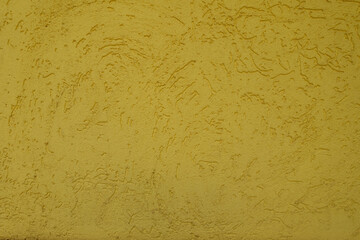 Background - yellow wall with stucco worm finish