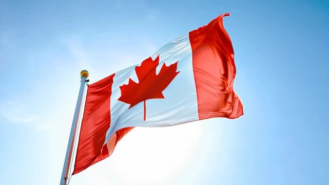 Canada flag waving in the wind against sunny blue sky background. Patriotism and national pride concept. Government and politics. Cultural heritage. Democratic elections