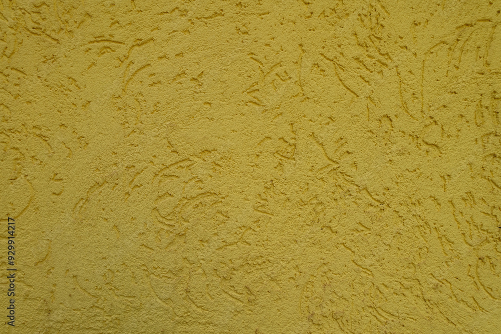 Poster Close view of yellow wall with stucco worm finish