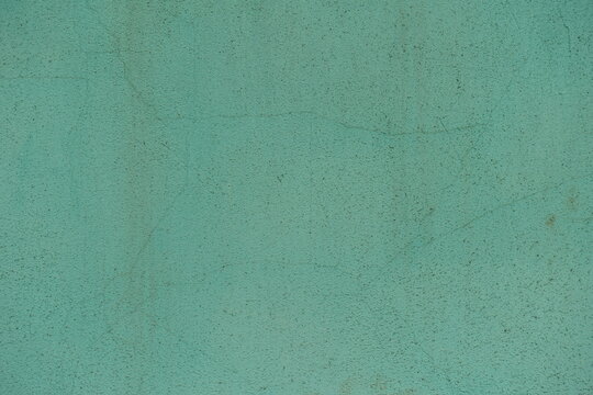 Backdrop - dirty and faded turquoise painted wall