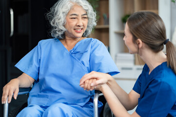 Elderly care concept. Portrait of nurse and her senior client on wheelchair.