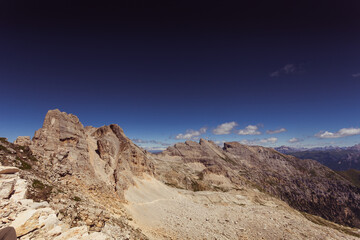 Spectacular landforms of the rocky crests of the Latemar Massif, with numerous peaks in the background. UNESCO world heritage site, Trentino-Alto Adige, Italy, Europe