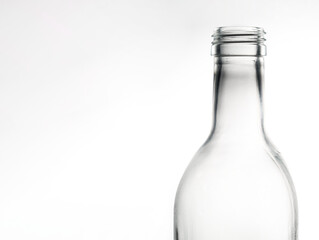 glass bottle with screw cap photographed on white background