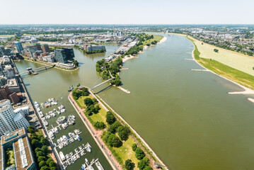 High top panoramic wide angle view of city buildings, river and media harbour from Dusseldorf Rhine Tower in North Rhine-Westphalia, Germany