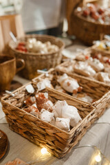 Sale of handmade ceramic Christmas tree toys at the Christmas Fair. Black Friday for the winter holidays.