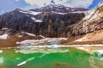 The small  Cavell pond and Angel glacier on Mount Edith Cavell. Jasper National Park Alberta Canada.