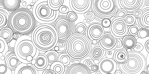 A detailed monochrome pattern featuring concentric circles of varying sizes