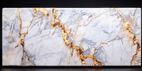 A white marble slab with gold accents
