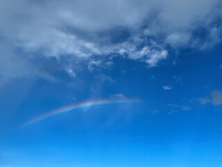 Fototapeta premium Rainbow with sunny blue sky
