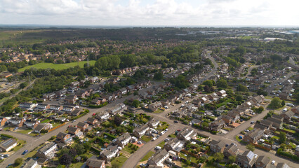 An aerial photograph looking down on a suburban area of bungalows and lowrise 