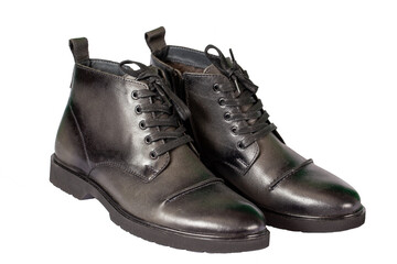 Classic black mens winter boots on a white background