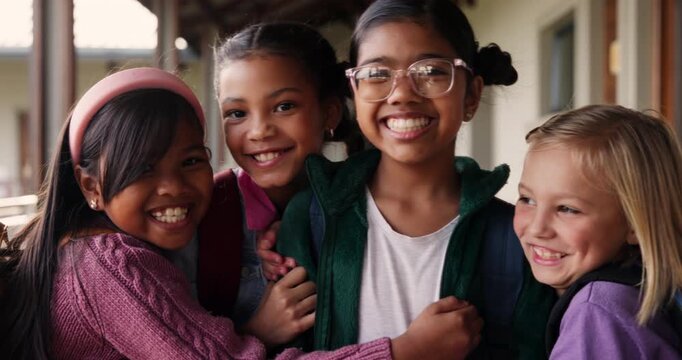Happy girl, student and friends with hug for break, recess or youth at primary school. Portrait of young children, kids or elementary learners with smile for friendship, knowledge or development