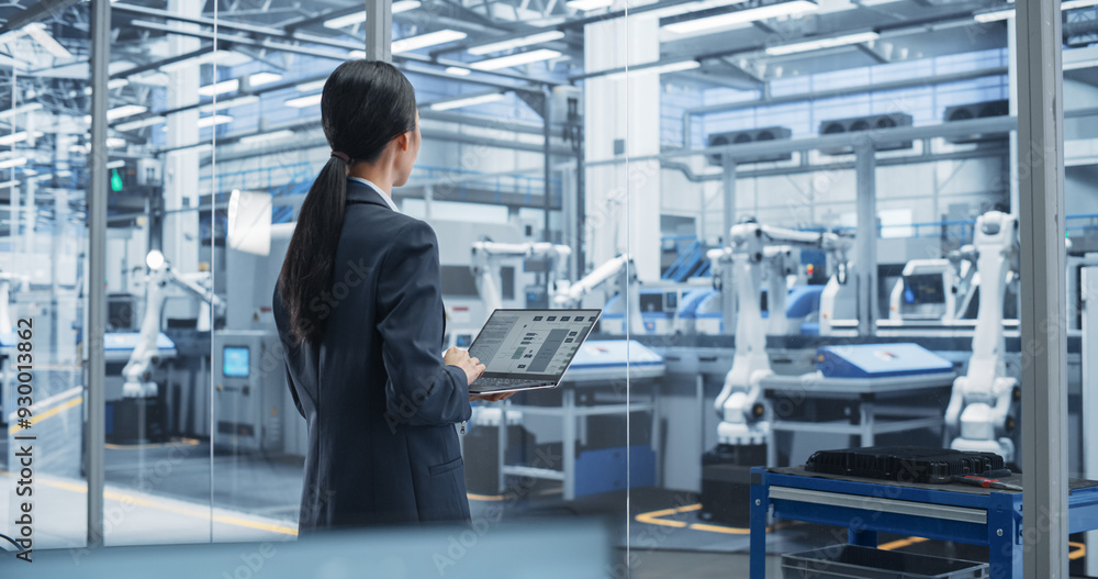 Aufkleber Electronics Manufacturing Technician Working on a Laptop Computer at a Factory Space. Asian Female Specialist Developing, Maintaining, Fine-Tuning Programs for Machine Production and Assembly