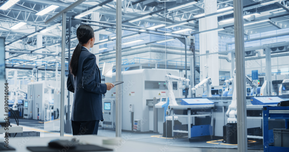 Aufkleber electronics manufacturing technician working on tablet computer at a factory space. asian female spe