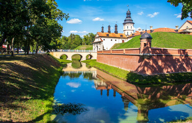 Fototapeta premium Nesvizh, Belarus - Nesvizh, Belarus - 08.08.2024 - Shot of the well know architectural landmark , Radzwill castle. Travel