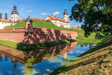 Naklejka premium Nesvizh, Belarus - 08.08.2024 - Shot of the well know architectural landmark , Radzwill castle. Landmark