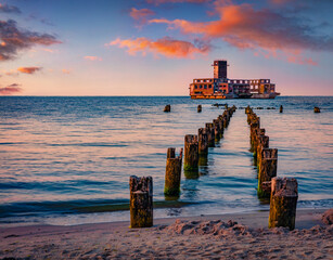 Calm summer view of ruins of Gdynia Babie Doly - central facility of German torpedo research centers, built in World War II, Kosakowo resort location. Amezing morning seascape of Bultic sea.
