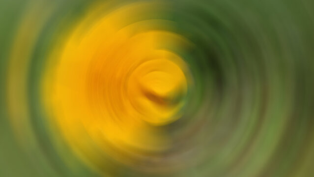 Yellow and green abstract illustration background with echo effect. Blur background with circle lines of energy. Modern digital backdrop for design element.