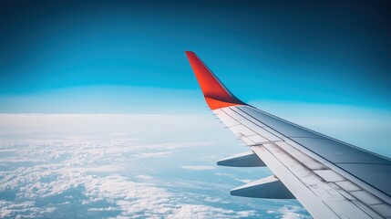 Fototapeta premium an airplane wing in mid-flight