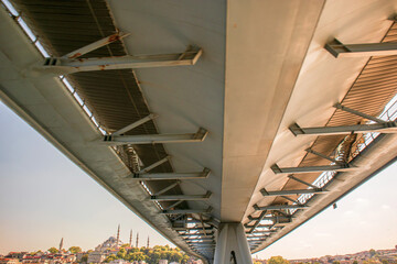 Obraz premium Bottom view of the metro bridge over the sea