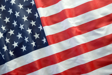 Fototapeta premium United States of America flag with stars and stripes close up. Official US Banner waving with folds