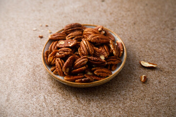 Organic pecan nuts on a plate