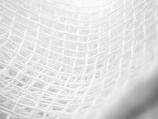 Close-up of white medical bandage Details and textures woven pattern background, Macro photo details of bandage weaving fibers, wallpapers