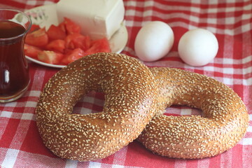 Turkish breakfast with tea, bagels (simit), pogaca, feta cheese and eggs