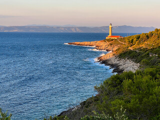 Lighthouse Stoncica at sunset light on island Vis, Croatia