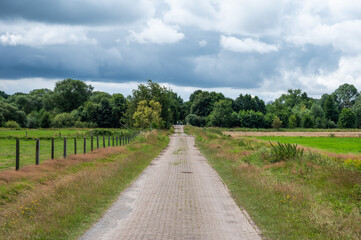 Cycling trail through the fields of the German countryside around Bredenau, Lower Saxony, Germany