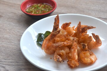 deep fried sea shrimp stuffed flour dipping chili sauce on plate
