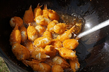 Deep-fried surimi. Fried crab claws. Surimi Crab Claw and battered fish snacks