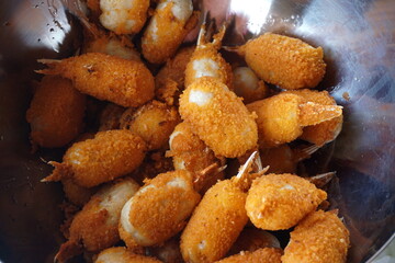 Deep-fried surimi. Fried crab claws. Surimi Crab Claw and battered fish snacks