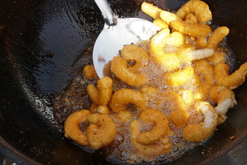 Deep-fried surimi. Fried crab claws. Surimi Crab Claw and battered fish snacks
