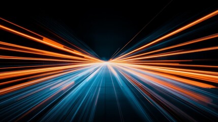 Dynamic light streaks in blue and orange create a sense of speed and energy against a dark background.