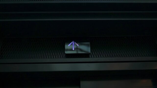 Digital elevator display showing arrow down, lift going down and up at mall, hotel or business center. Close up view. Technology and transportation concept, High quality FullHD footage