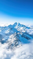 Naklejka premium An aerial view of a mountain range with snow-capped peaks, deep valleys, and clouds drifting over the landscape, creating a majestic and awe-inspiring scene