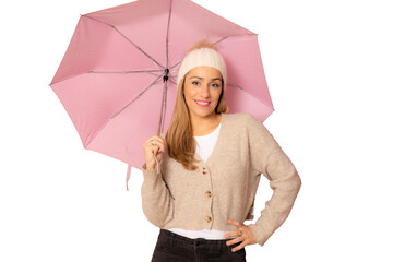Portrait of a smiling beautiful woman holding umbrella and looking up isolated over transparent...
