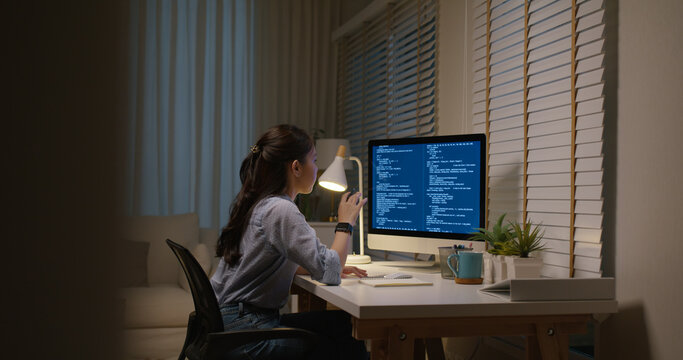 New possible digital transformation future workforce. Asia people young talent woman busy work late night at home office reskill upskill martech job remote test on AI cloud computing cyber security.