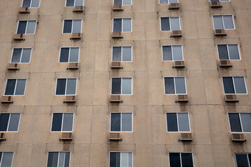 Overcrowded Residential Building Facade with Air Conditioning Units