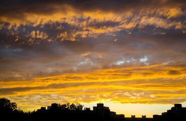 Sky in a fire sunset, beautiful sunrise or sunset sky over the sity background