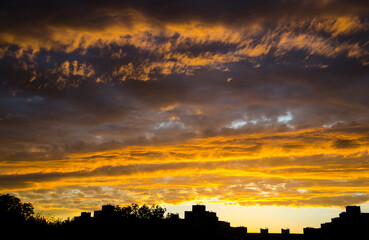 Sky in a fire sunset, beautiful sunrise or sunset sky over the sity background