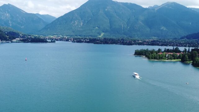 Ship over the Tegernsee with Alps panarama shot by drone