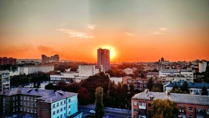 Obraz premium Персиковый закат, вид из окна. г. Днепр, Украина