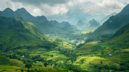 Lush green valley surrounded by mountains, showcasing a breathtaking natural landscape