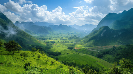Lush green valley surrounded by mountains, showcasing a breathtaking natural landscape
