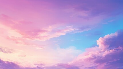 Obraz premium Pastel sky filled with soft pink and purple clouds during a colorful sunset.