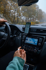couple holding hands in road trip